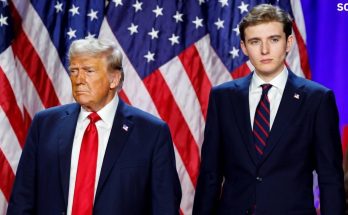Donald Trump and Barron Trump with American flags