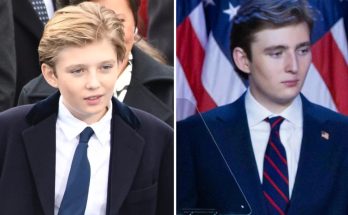 Barron Trump standing with family in public