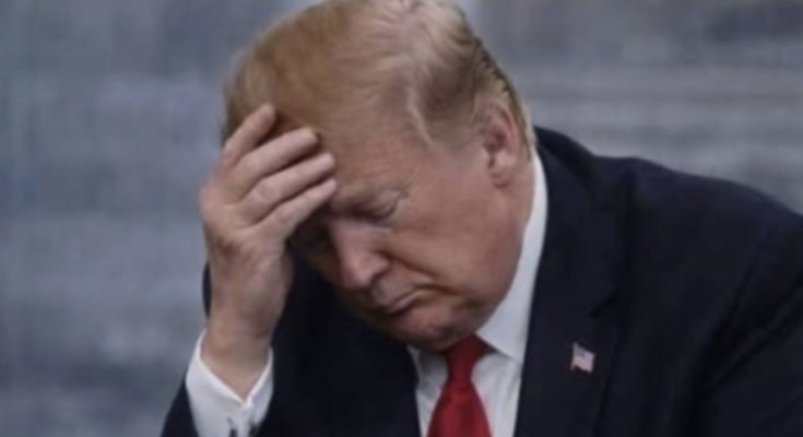 Donald Trump standing quietly in Washington