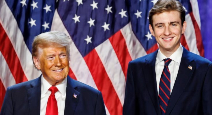 Barron Trump standing quietly at public event