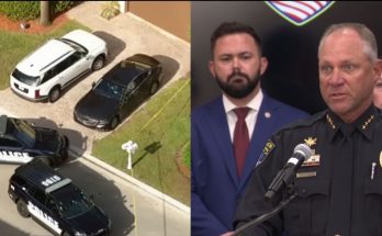 Police chief at press conference beside crime scene