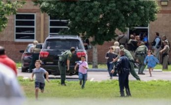 Children running from school shooting scene