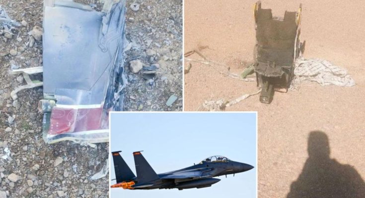 F-15 fighter jet wreckage in desert