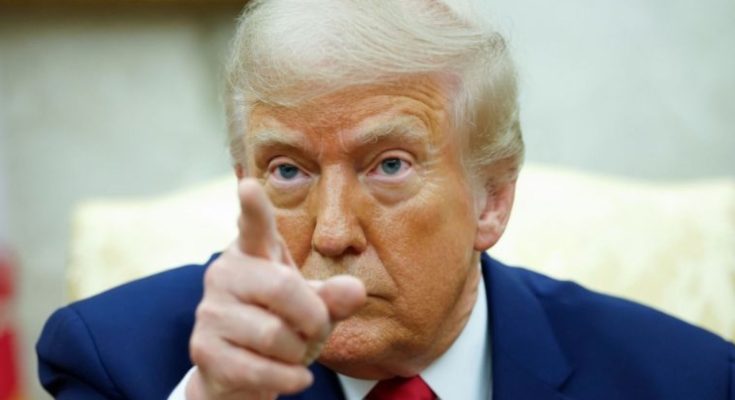 Donald Trump pointing at camera