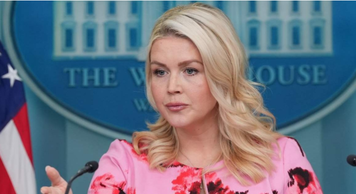 Woman speaking at White House press briefing