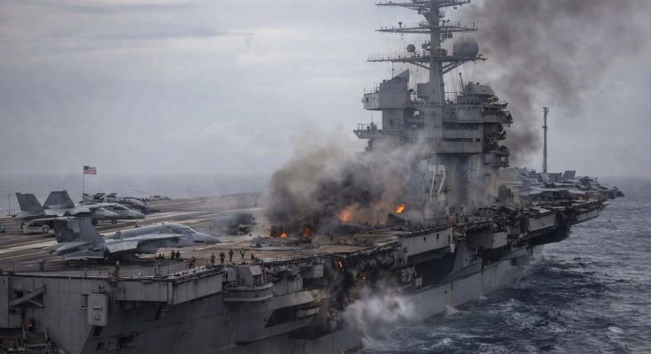 Aircraft carrier on fire at sea