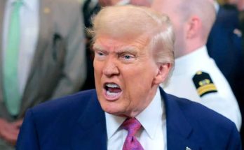 former President Donald Trump shouting during a public event with military personnel in