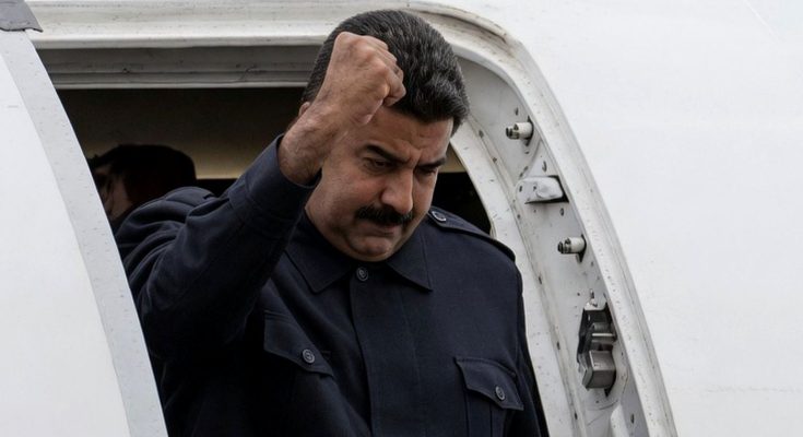Nicolas Maduro fist salute from plane