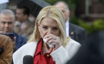ivanka Trump wipes tears while speaking to reporters outdoors in rain