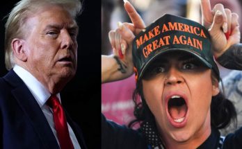 donald Trump in suit and red tie beside supporter wearing 'Make America Great Again' cap