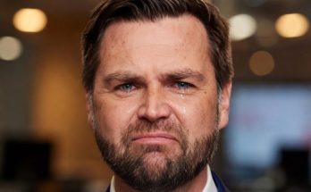 man with tears in eyes, emotional office setting, focus on facial expression
