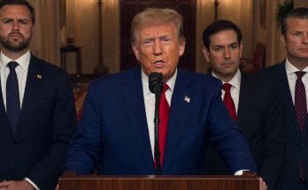 donald Trump speaking at podium with J.D. Vance, Marco Rubio and Pete Hegseth standing