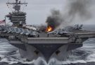 Aircraft carrier on fire at sea