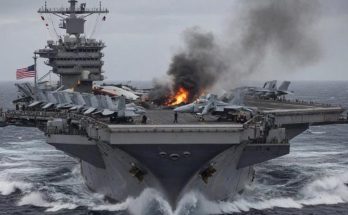 Aircraft carrier on fire at sea