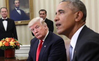 Trump and Obama sitting together in meeting