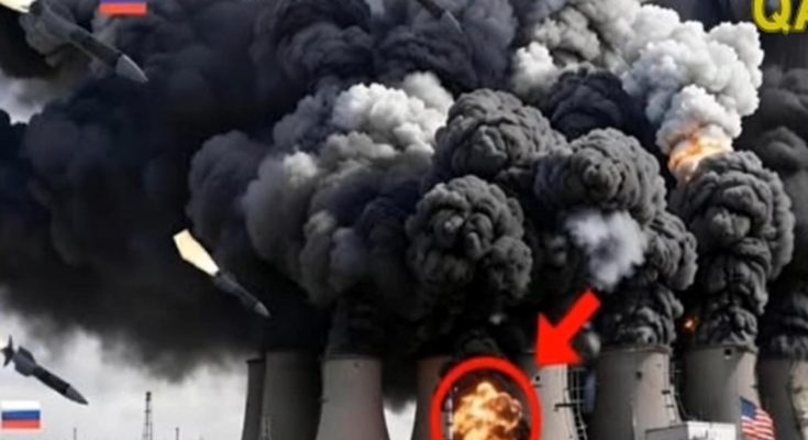russian missiles strike power plant cooling towers with massive black smoke plumes rising