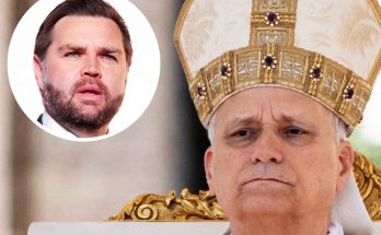 cardinal Robert Prevost wearing ornate papal mitre with inset circular portrait of JD