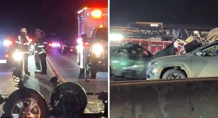 emergency responders at night scene of multi-vehicle crash with damaged cars and
