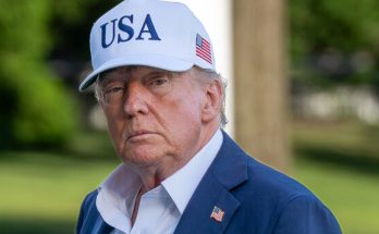 Donald Trump wearing USA cap