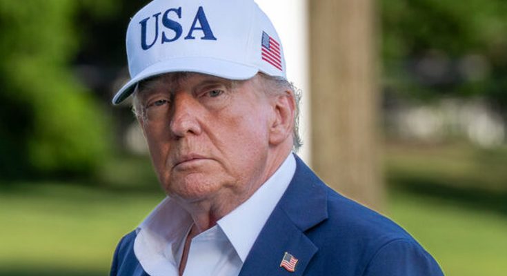 Donald Trump wearing USA cap