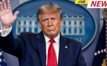 Trump fires official escorted by police