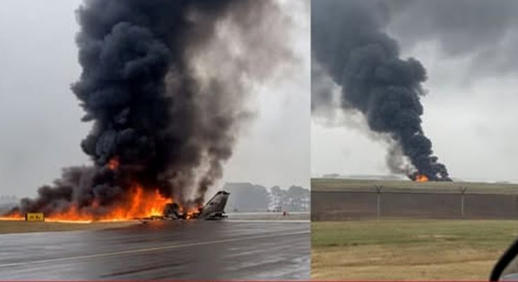 Plane crash burning wreckage black smoke