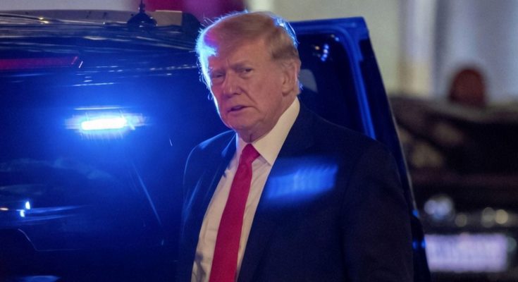 Donald Trump serious expression at night