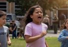 Children running in panic outdoors